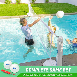 a woman and a child playing volleyball in a pool